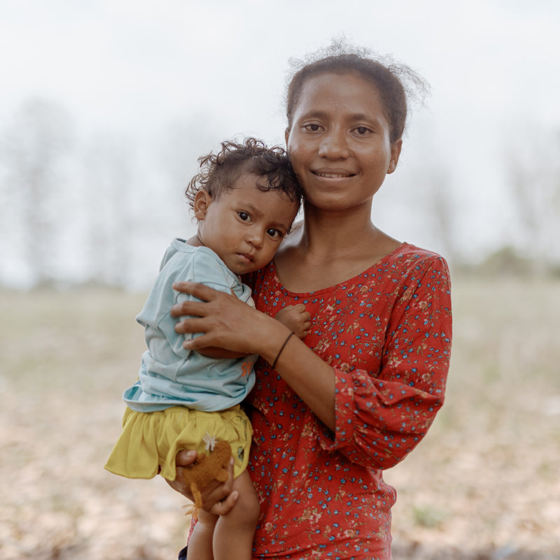 Woman holding a young child