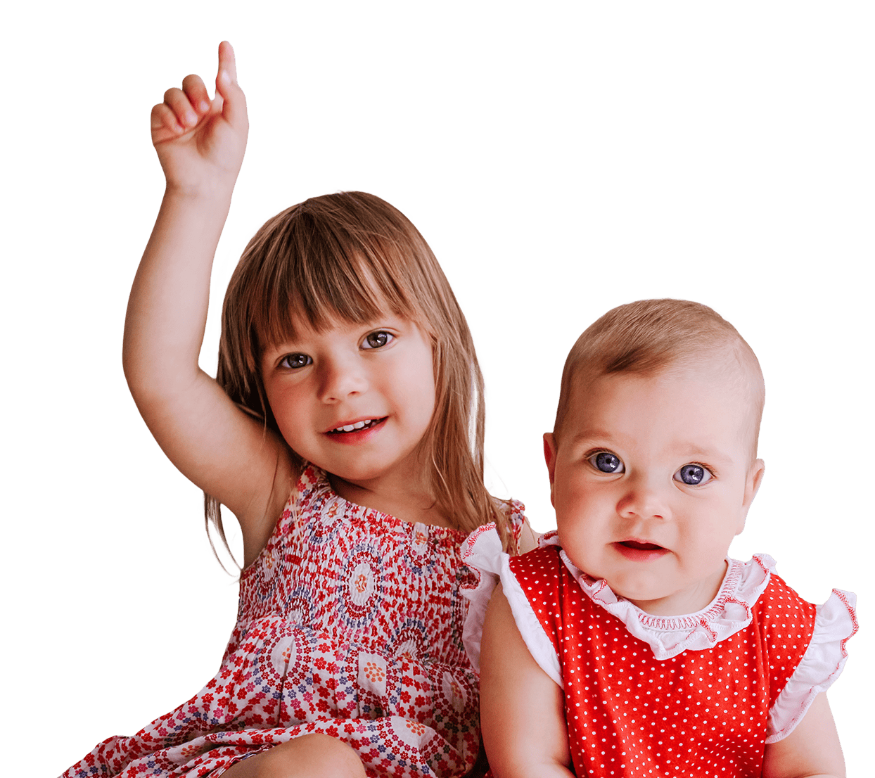 two toddlers with sparkling eyes