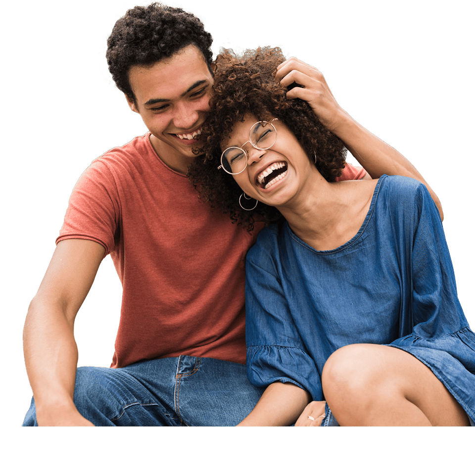 Man and woman hugging and laughing