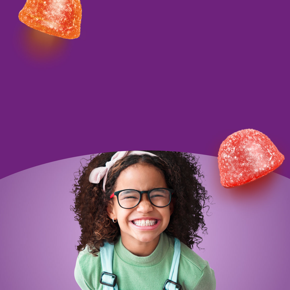 Young girl with glasses smiling against a purple background with gummy candies.