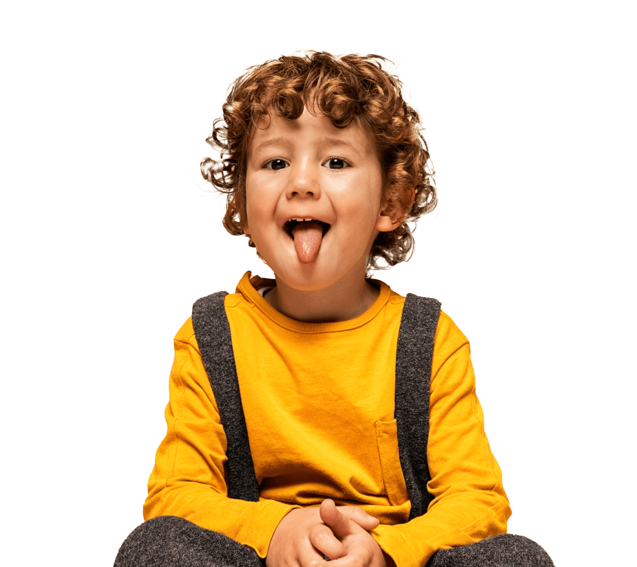 kid playfully sticking out his tongue