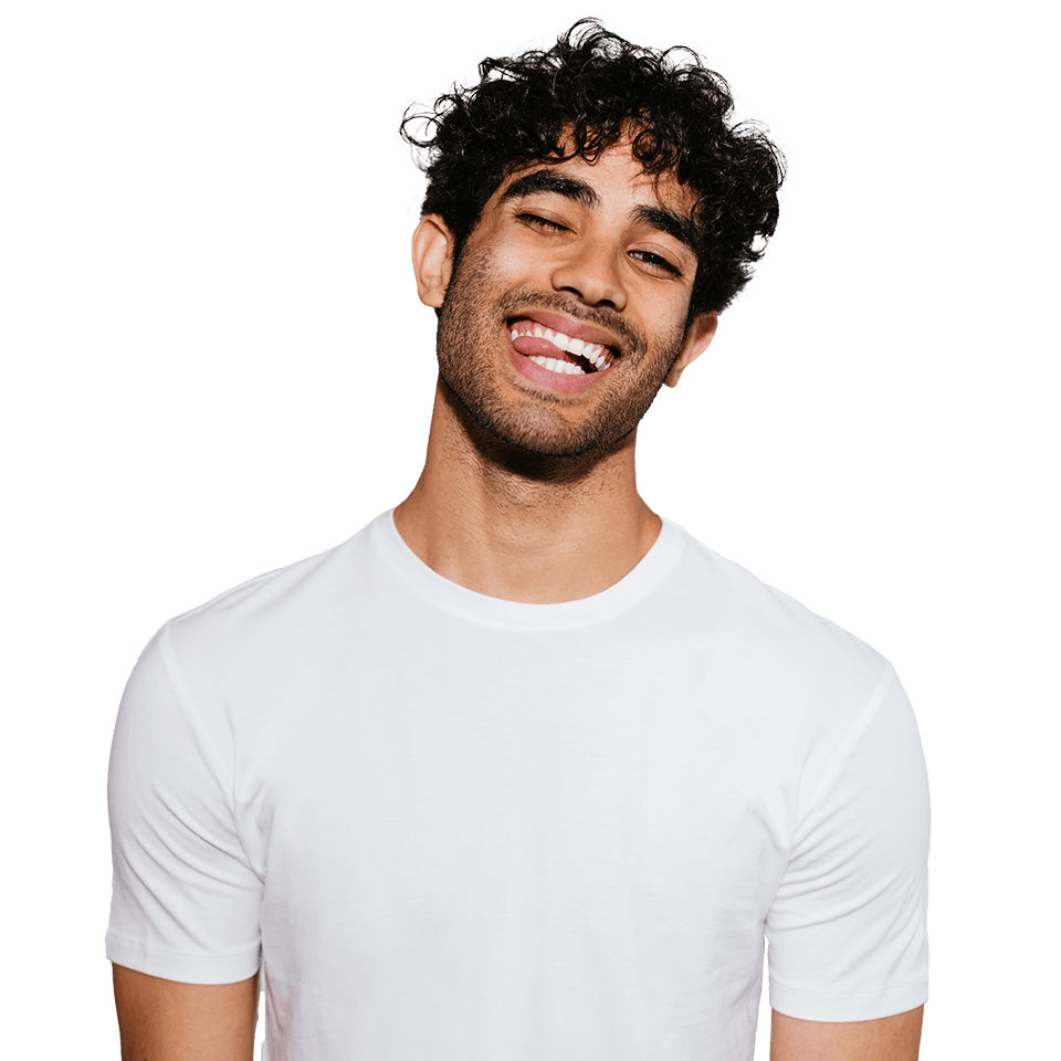 smiling man winking and biting his tongue