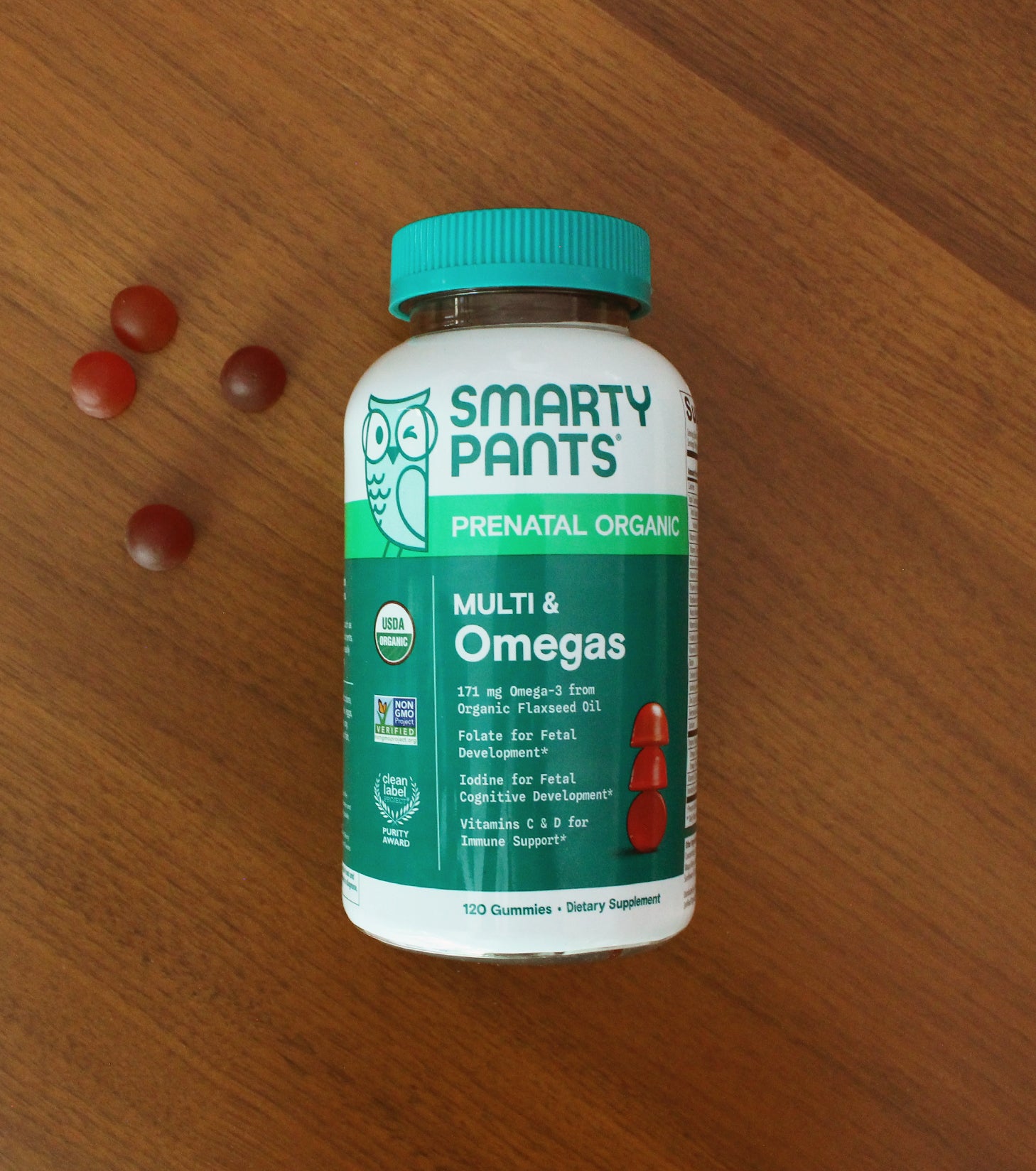 prenatal organic multi omegas laying on a table