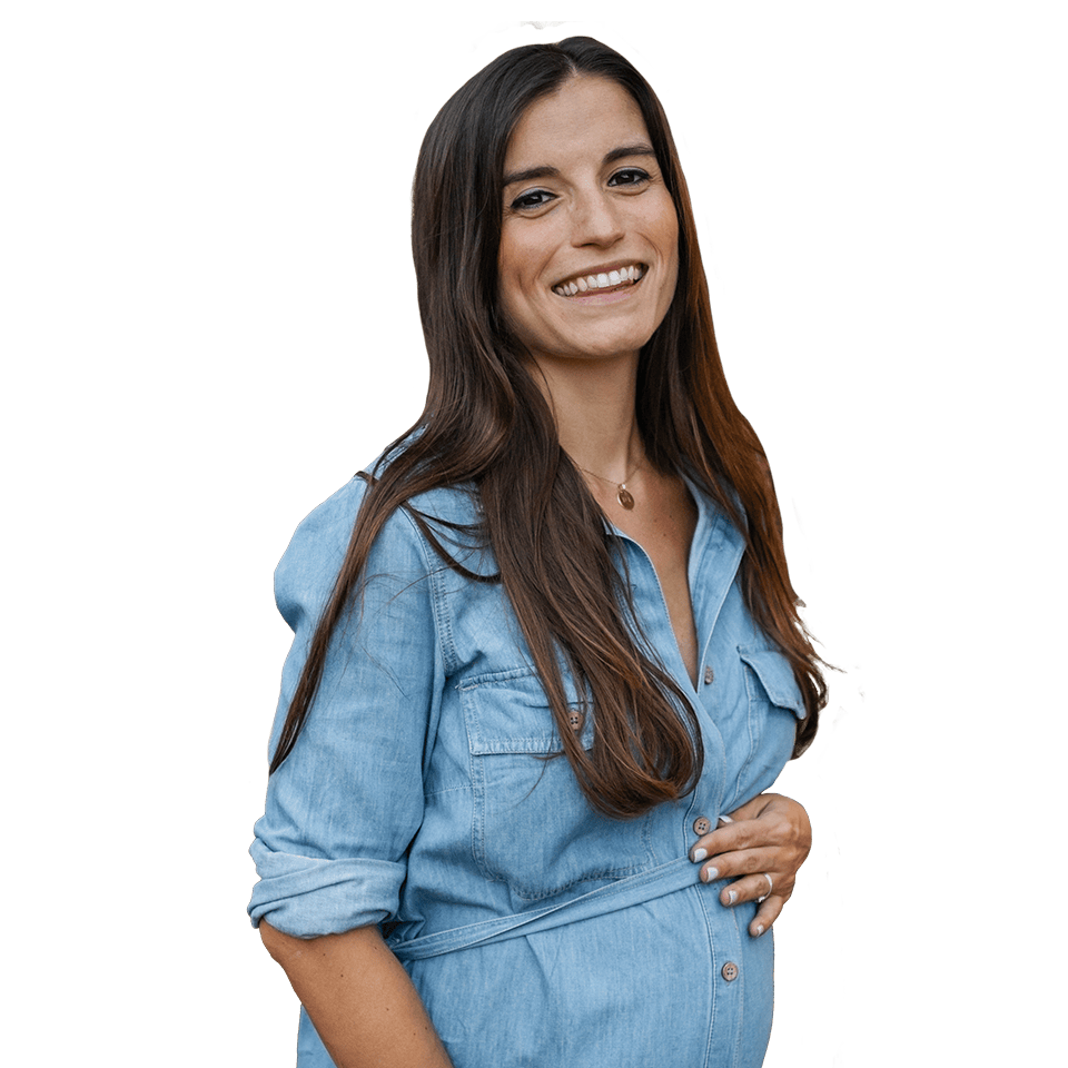 smiling woman in early pregnancy