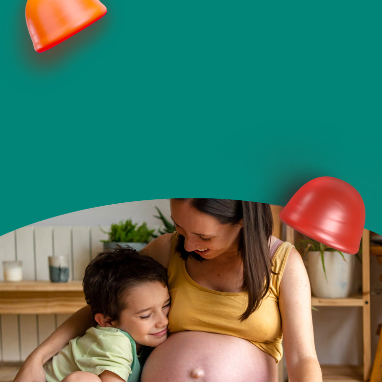 Woman with a child sitting on her lap in a room with shelves