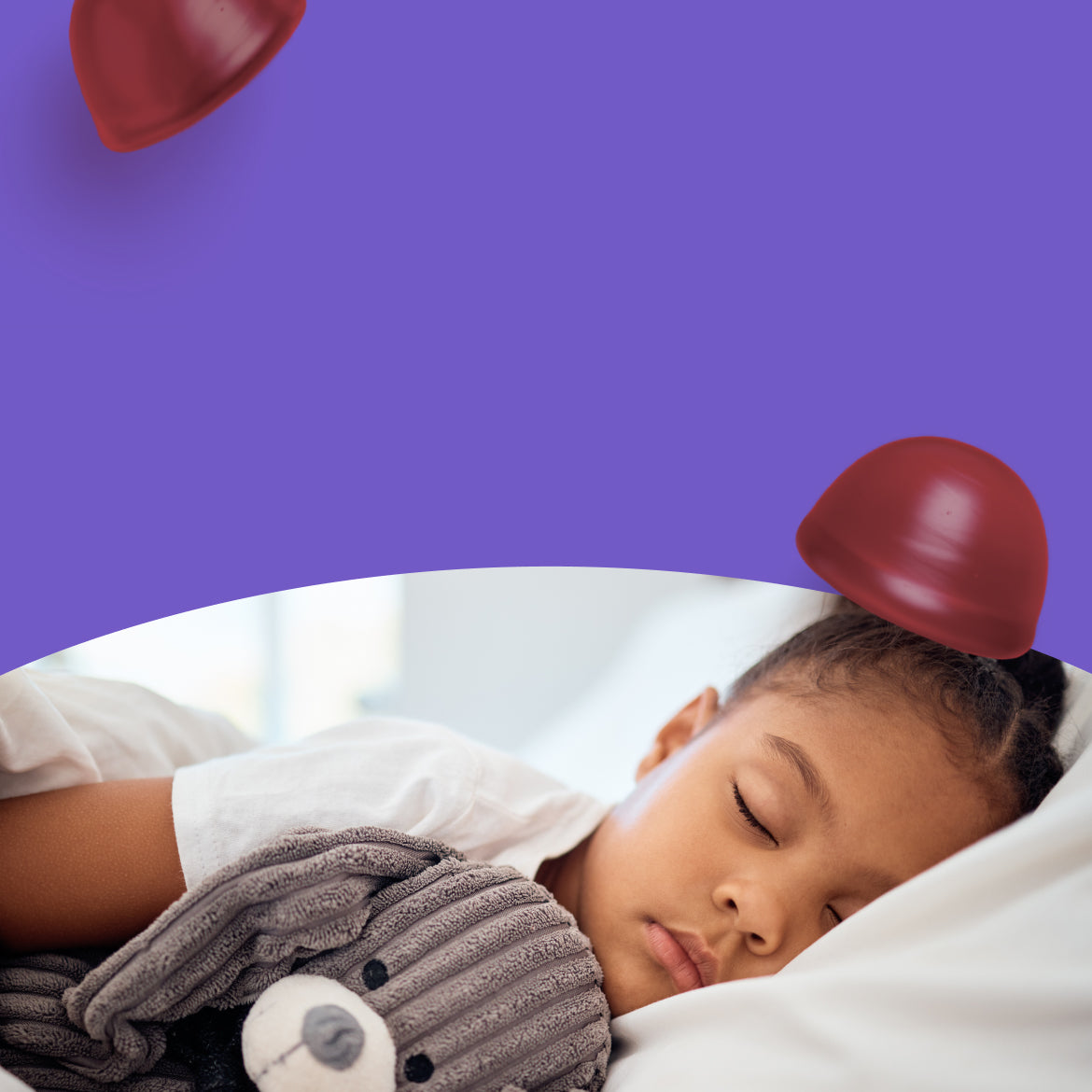 Child sleeping in bed with a teddy bear on a purple background