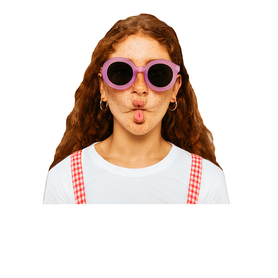teen girl in sunglasses making a goofy face