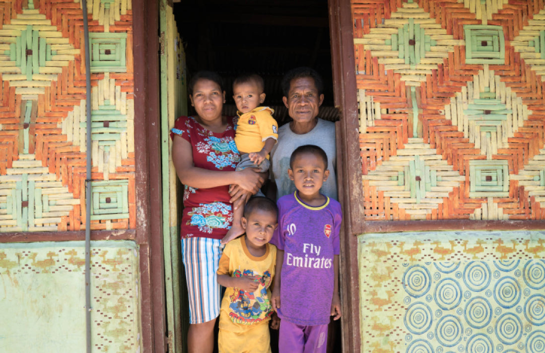 Family standing in doorway
