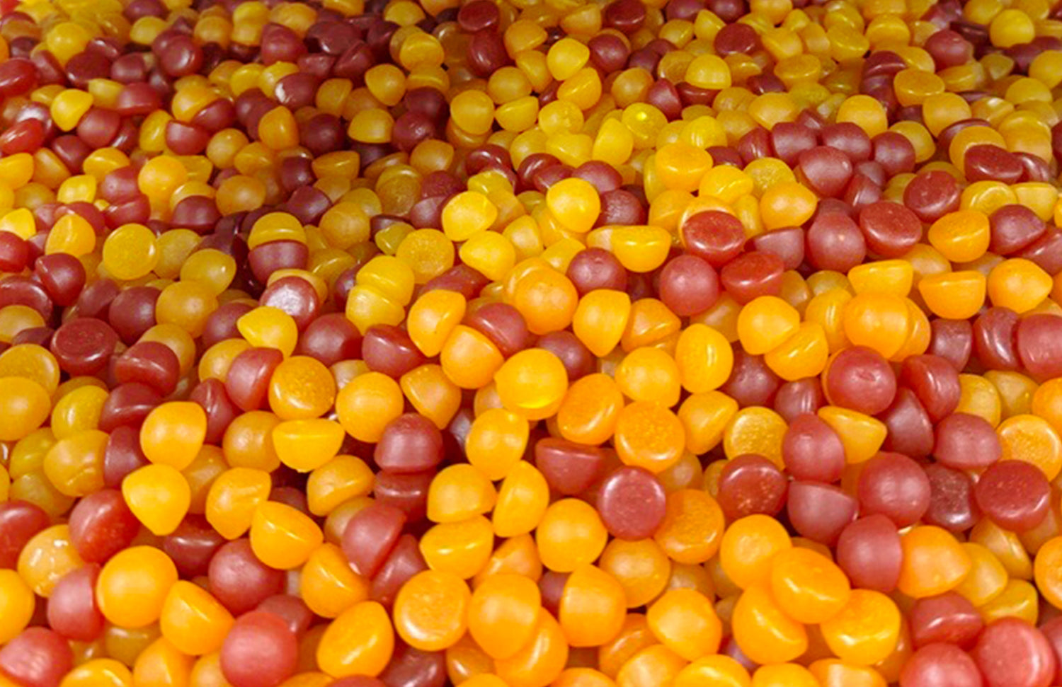Close-up of red and yellow gummies