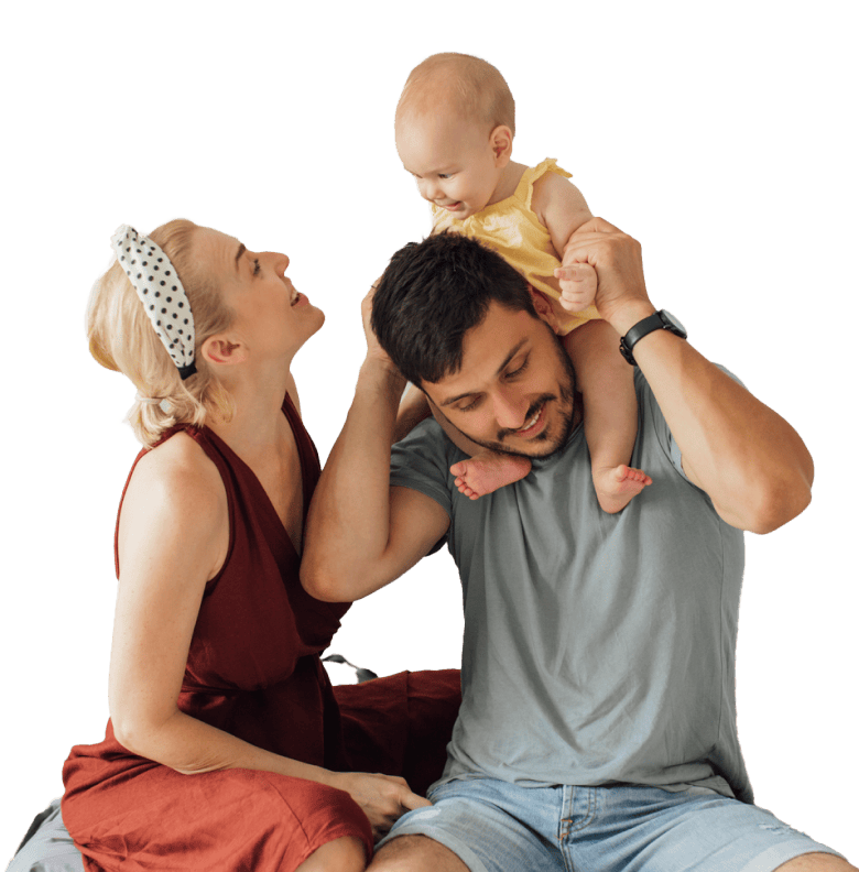 family with baby on dad's shoulders