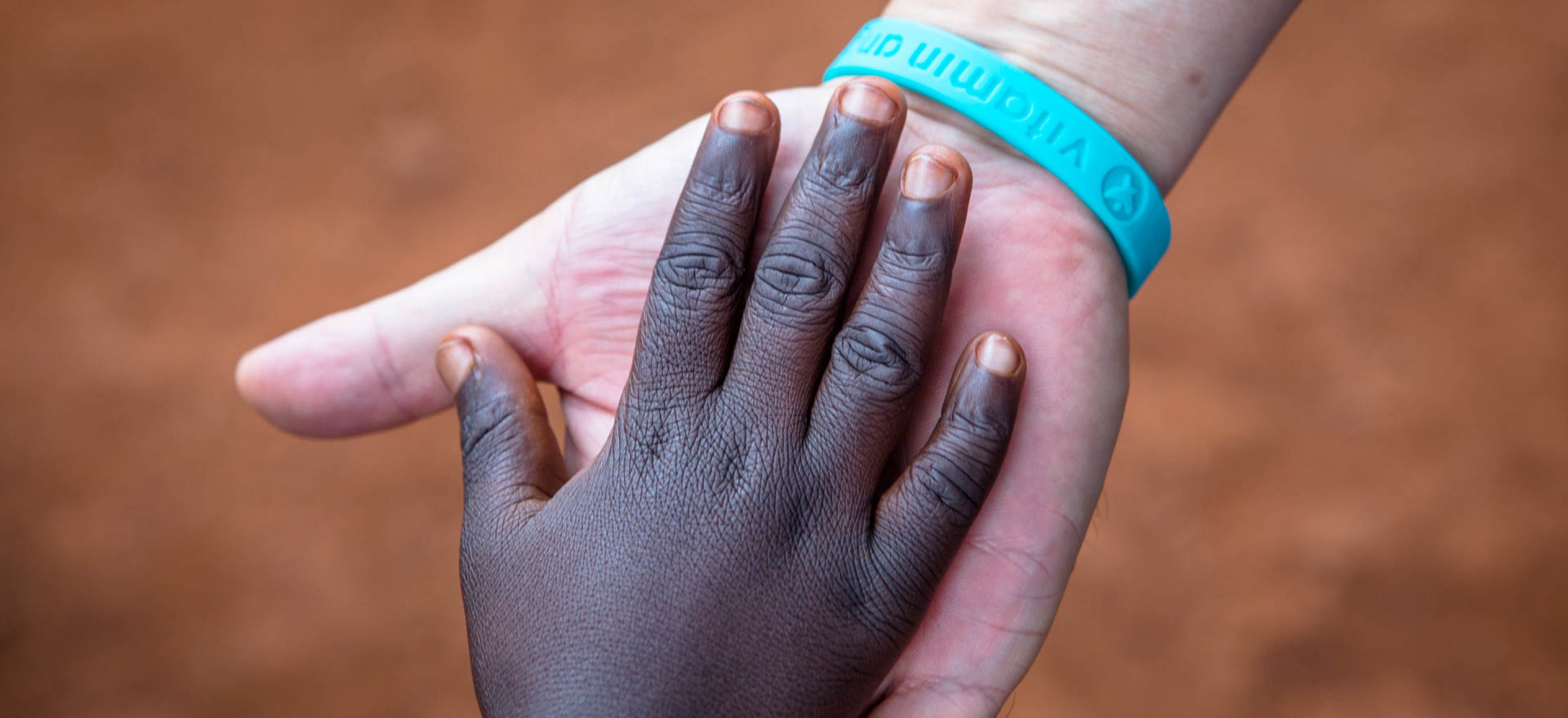 Two hands touching